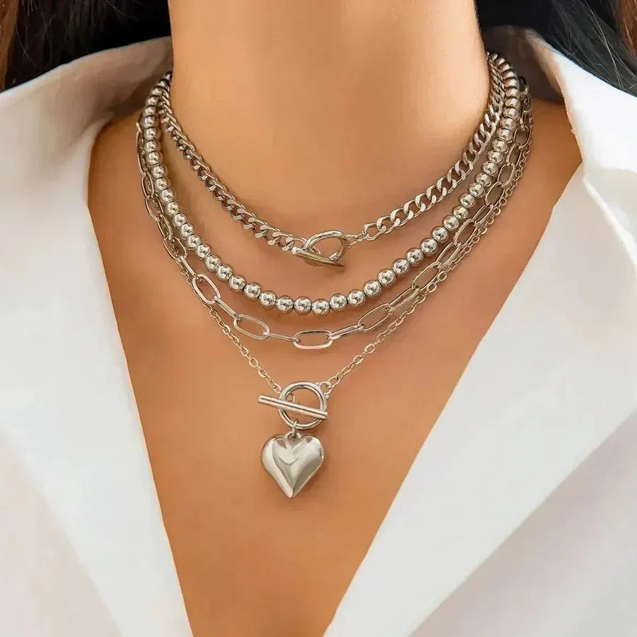 Gelaagde hartketting in goud
