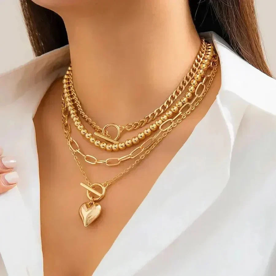 Gelaagde hartketting in goud