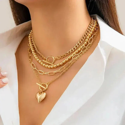 Gelaagde hartketting in goud