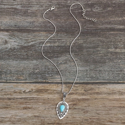 Turquoise druppelketting Arlisse in wit goud