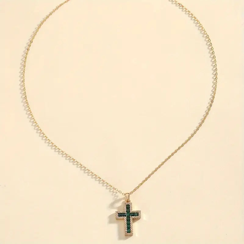 Ketting met smaragd kruis in goud