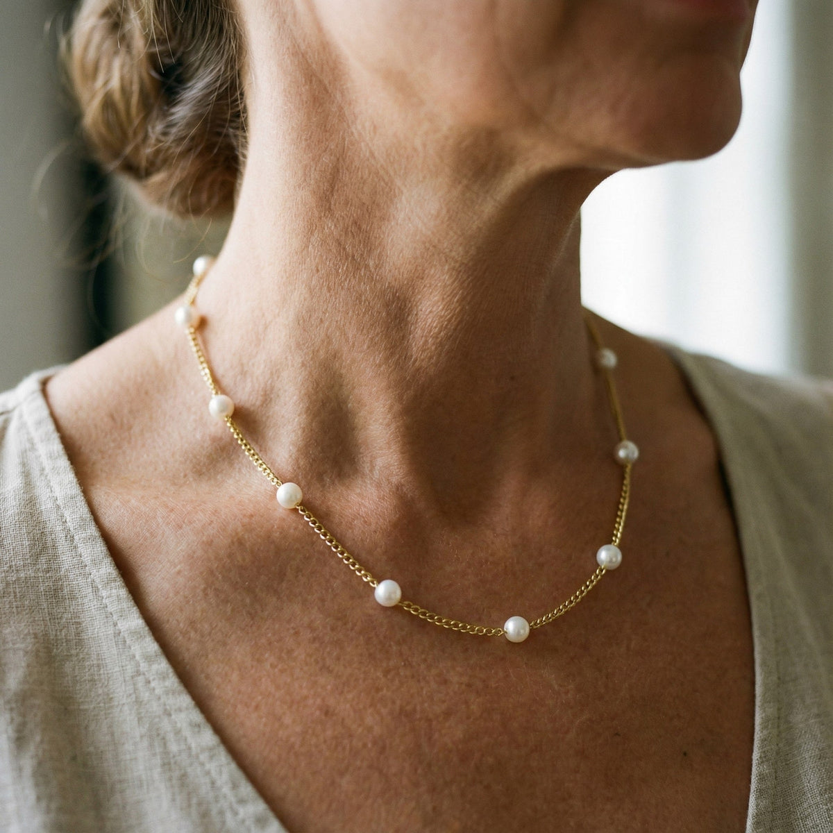 Ketting met natuurlijke parel in goud