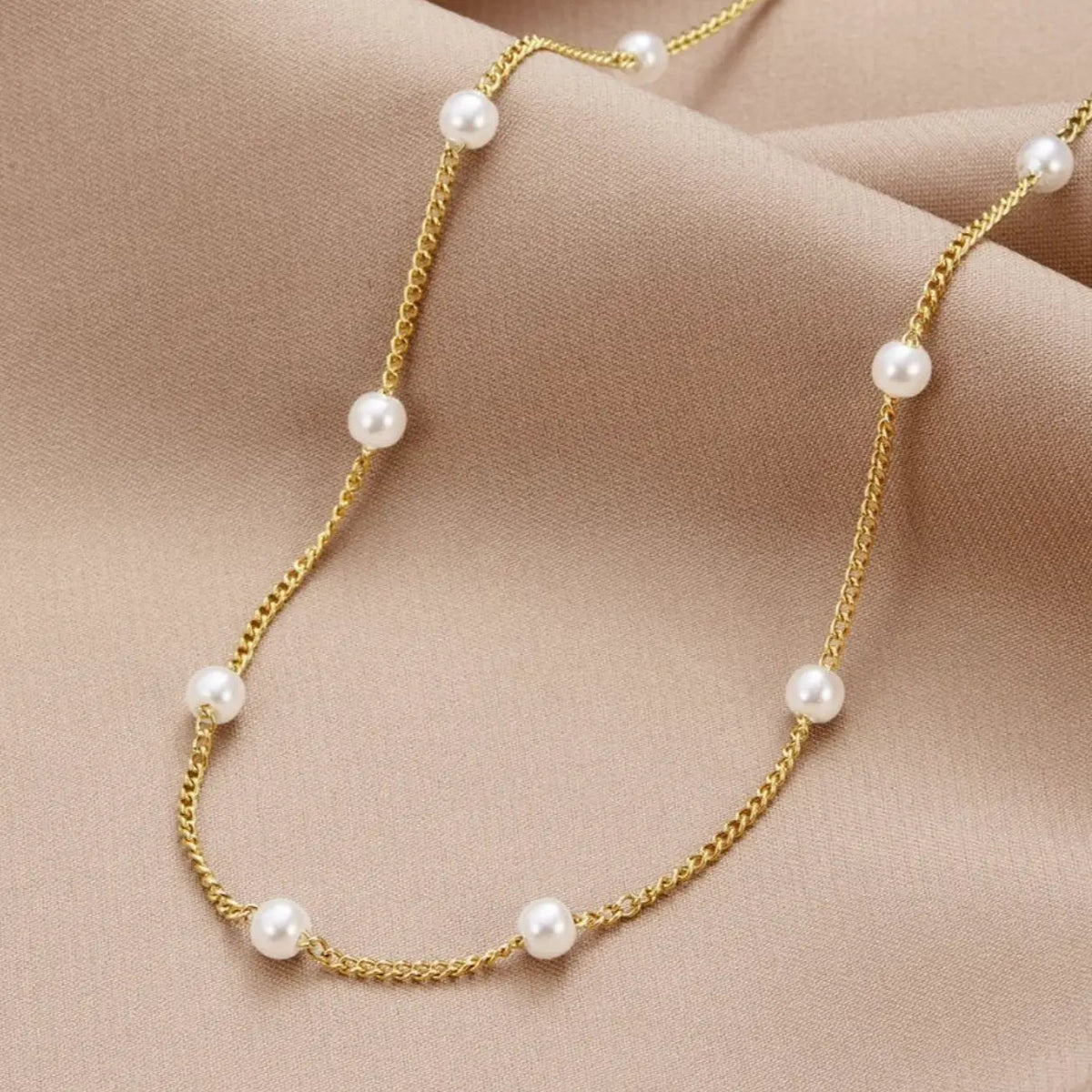 Ketting met natuurlijke parel in goud