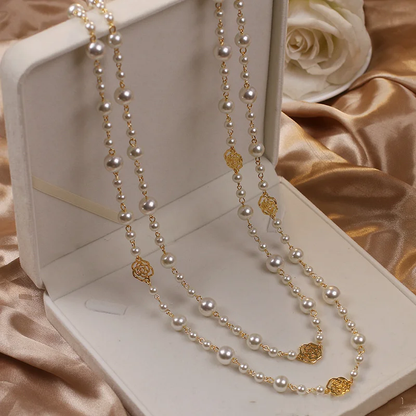 Elegante ketting met klein pareltje in goud