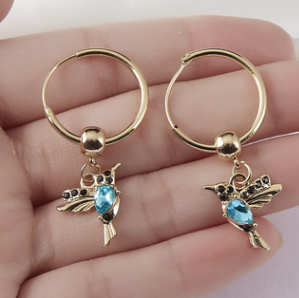 Ketting en oorbellen Kameleon in goud