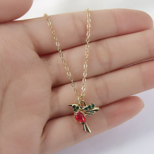 Ketting en oorbellen Kameleon in goud