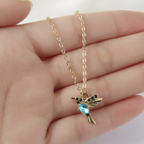 Ketting en oorbellen Kameleon in goud
