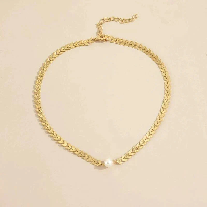 Griekse ketting met parel in goud