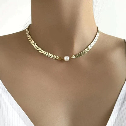 Griekse ketting met parel in goud