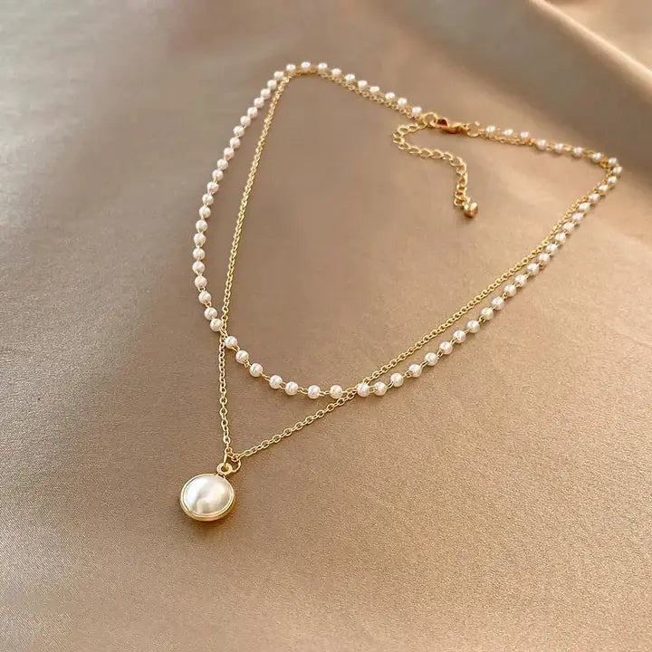 Luxe ketting met parels in goud