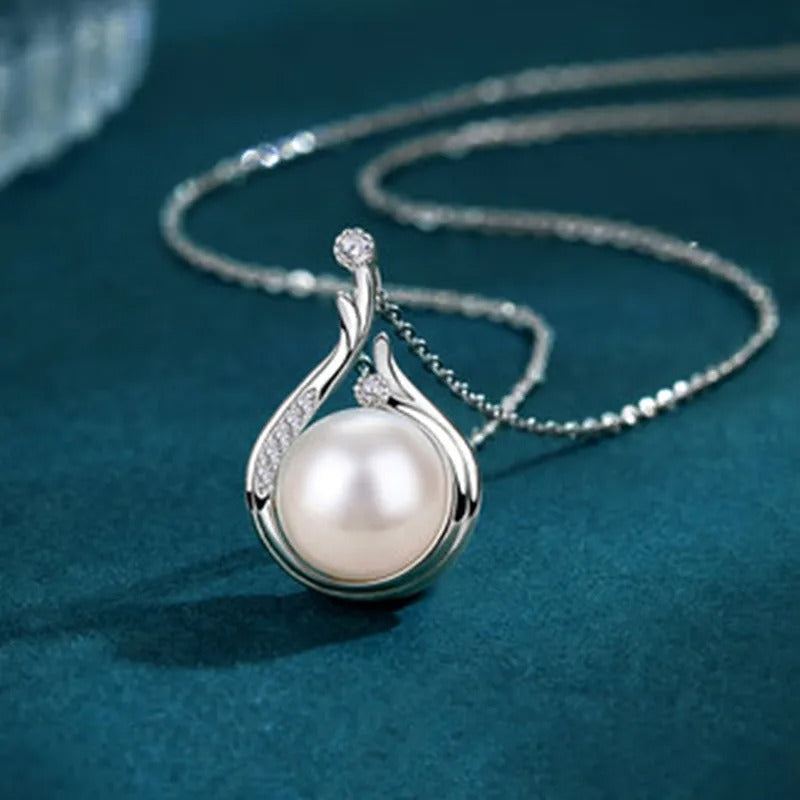Retro ketting met druppelvormige parels in wit goud