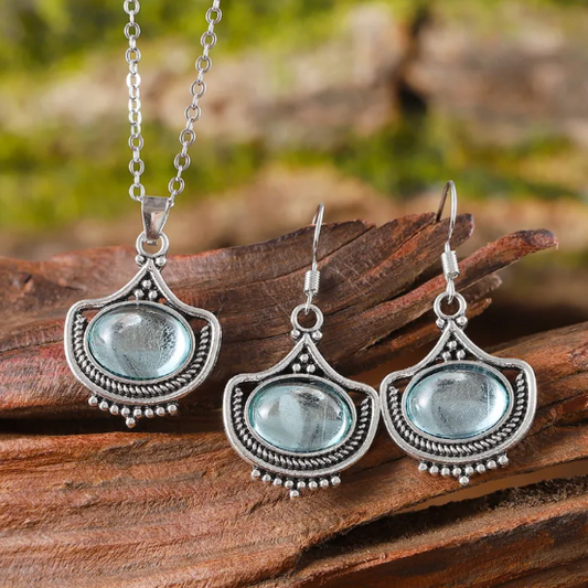 Retro ketting en oorbellen met blauwe ovale edelstenen | Goud