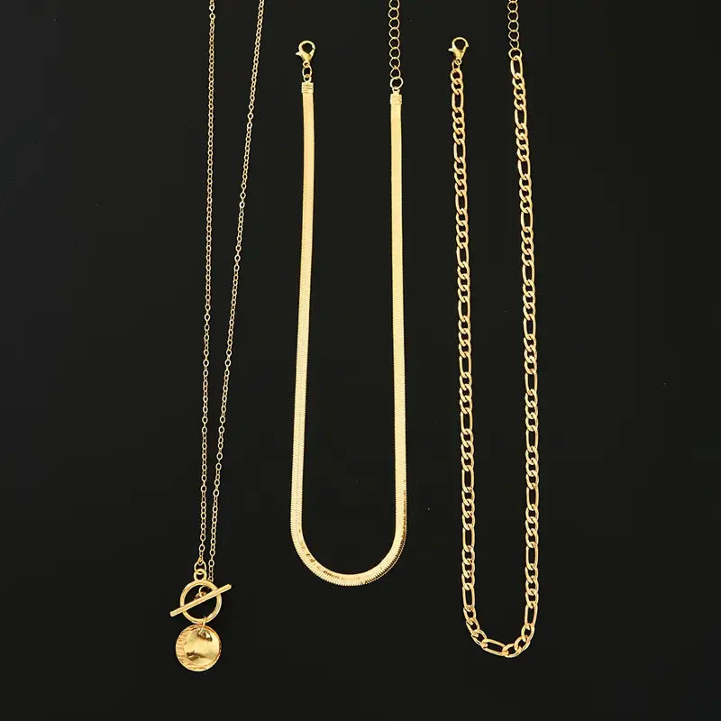 Gelaagde ketting Savira met getextureerde munt in goud