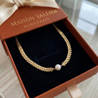 Griekse ketting met parel in goud