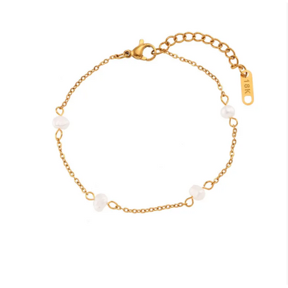 Complete roestvrijstalen ketting- en armbandset met madeliefjes in goud
