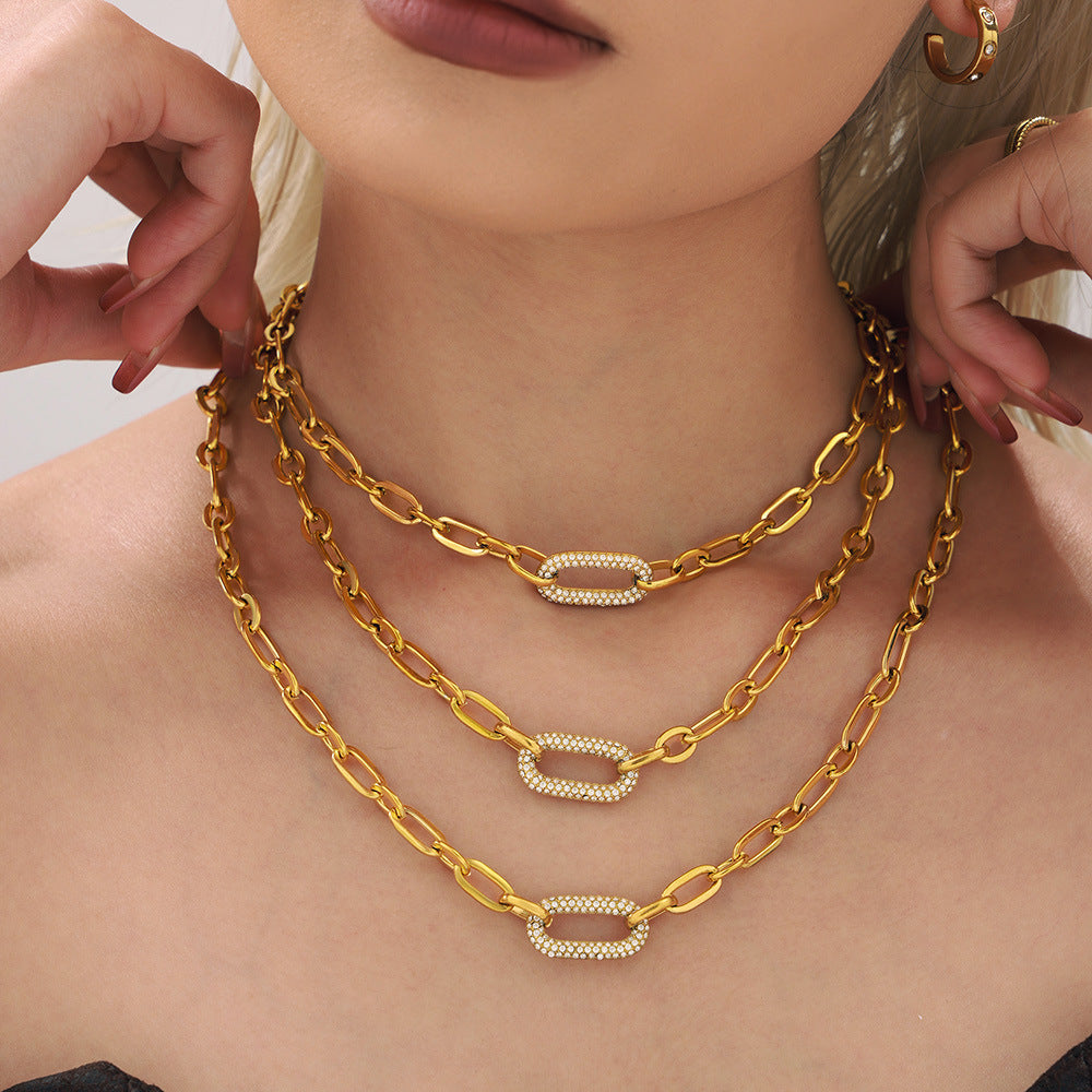 Sieradenset met dikke pavé-schakelketting in goud