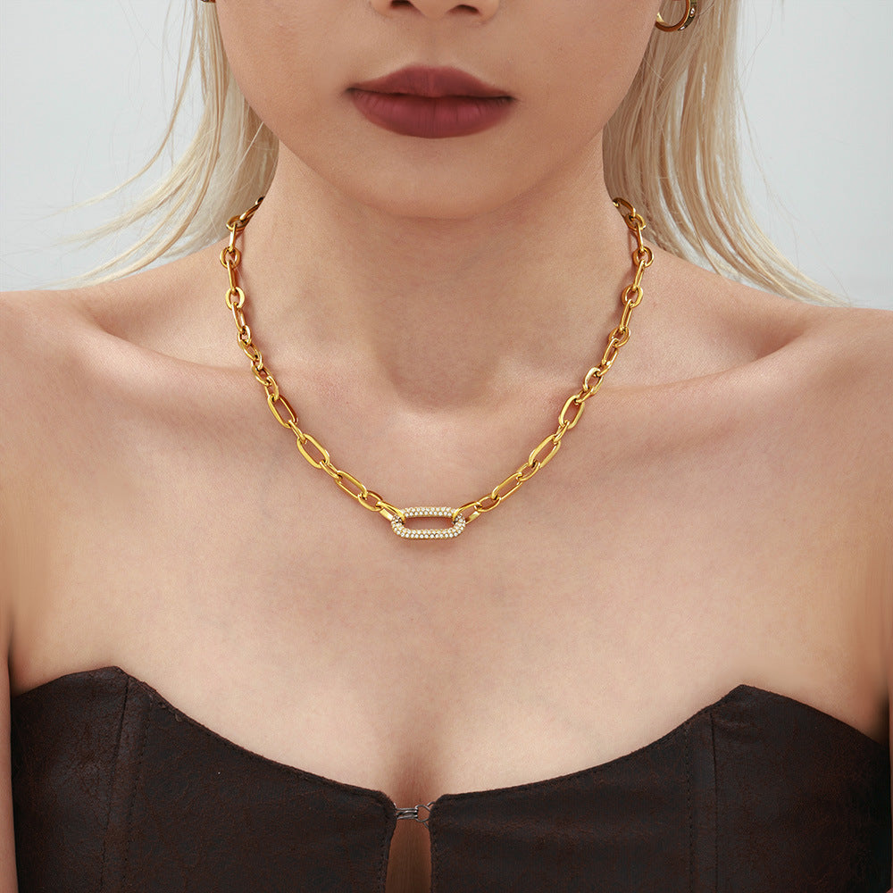 Sieradenset met dikke pavé-schakelketting in goud