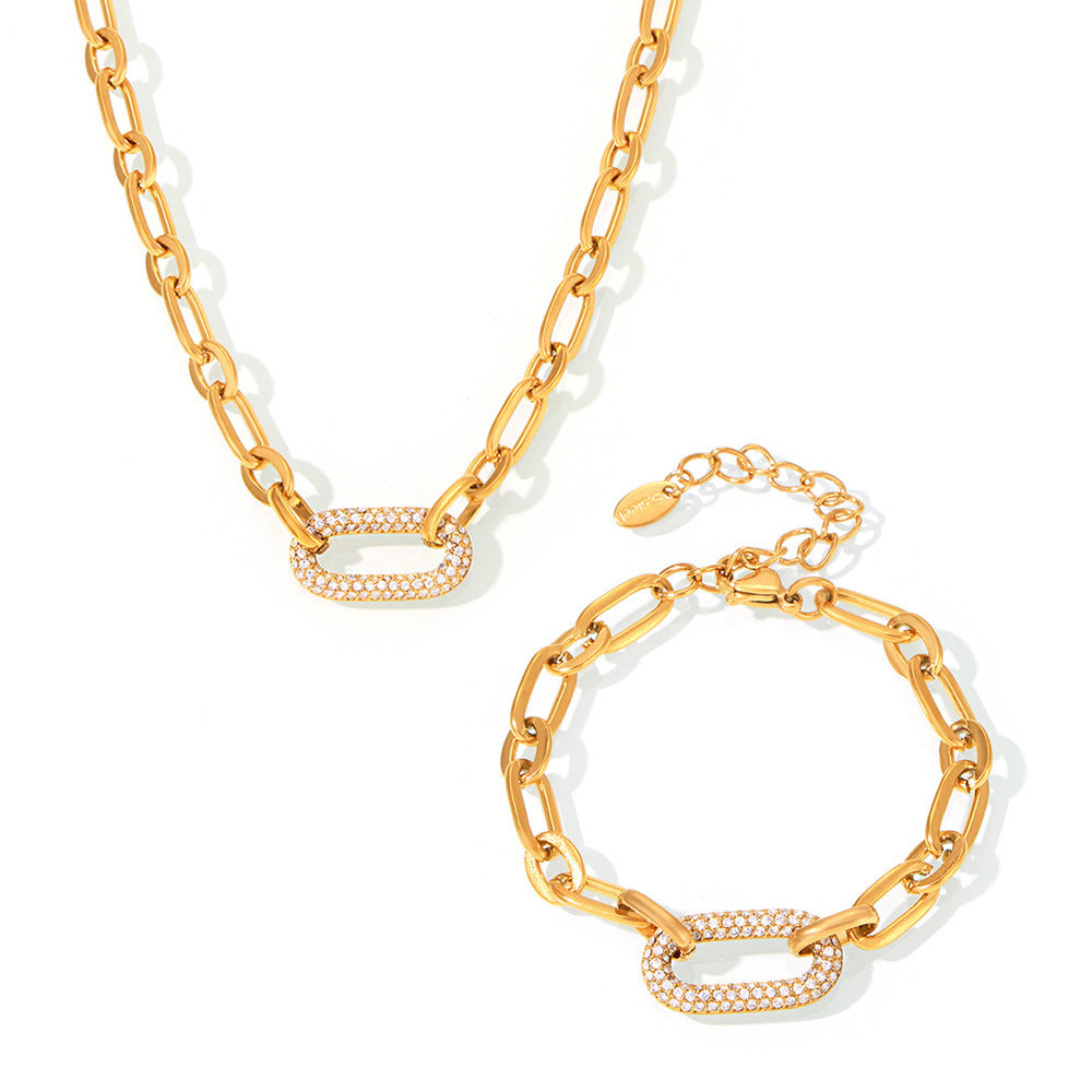 Sieradenset met dikke pavé-schakelketting in goud