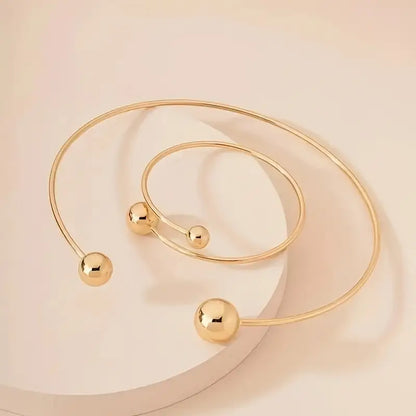 Stralende minimalistische armband- en kettingset | Goud