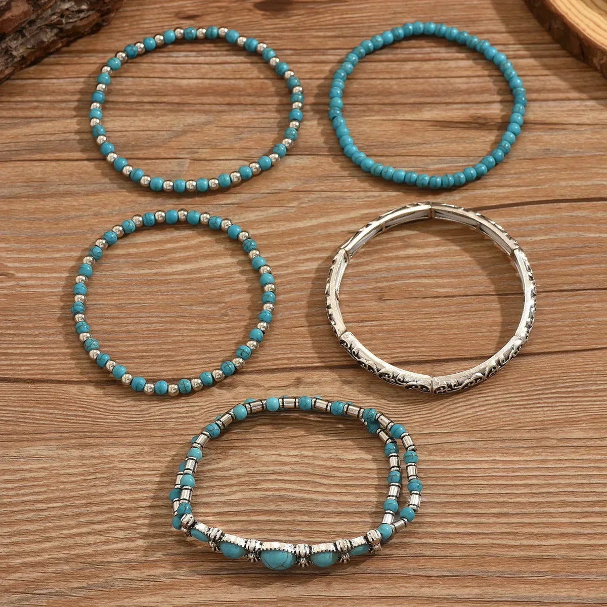 Boho-armbandenset met turquoise kralen in goud