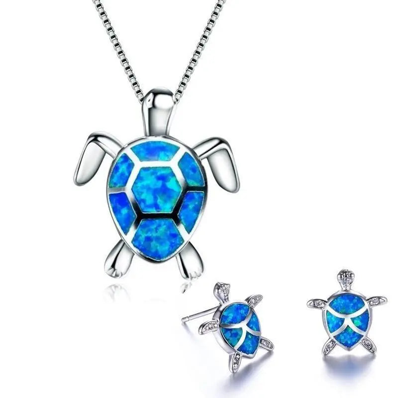 Ketting- en oorbellenset met opaal zeeschildpad in wit goud
