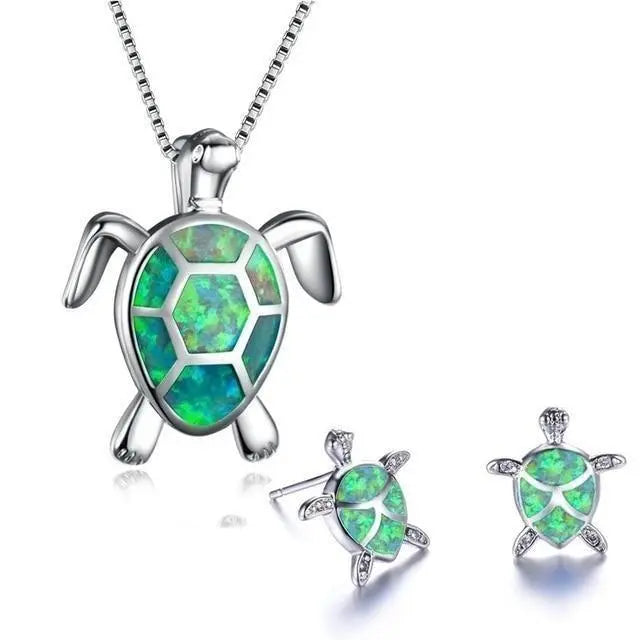 Ketting- en oorbellenset met opaal zeeschildpad in wit goud
