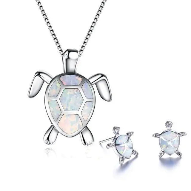 Ketting- en oorbellenset met opaal zeeschildpad in wit goud