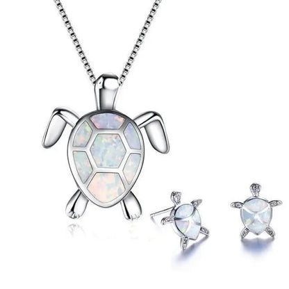 Ketting- en oorbellenset met opaal zeeschildpad in wit goud