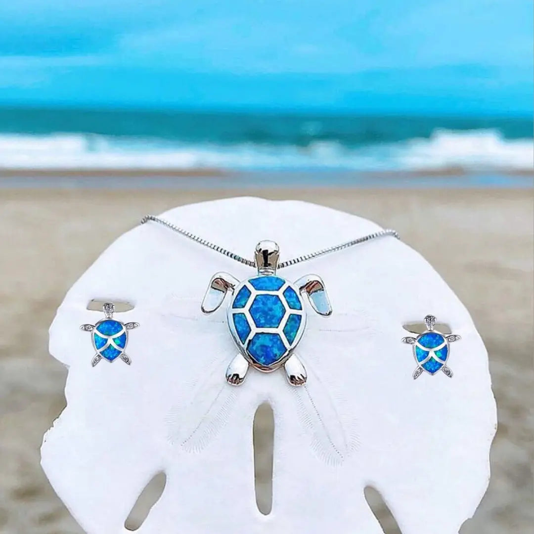 Ketting- en oorbellenset met opaal zeeschildpad in wit goud
