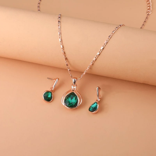 Ketting- en oorbellenset met groen kristal | Goud