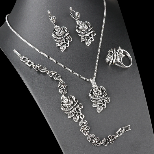 Elegante glinsterende set | Witgoud