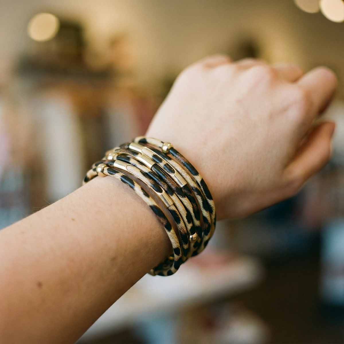 Lange gelaagde boho-sleutelhanger in goud