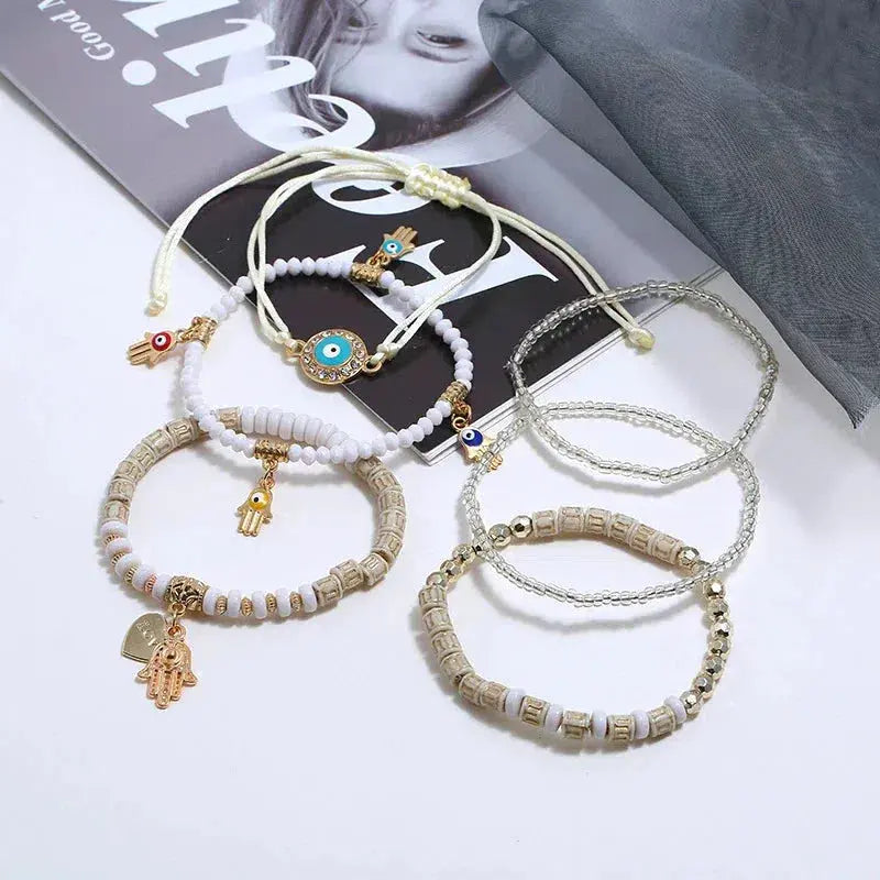Hamsa-armbandenset in goud