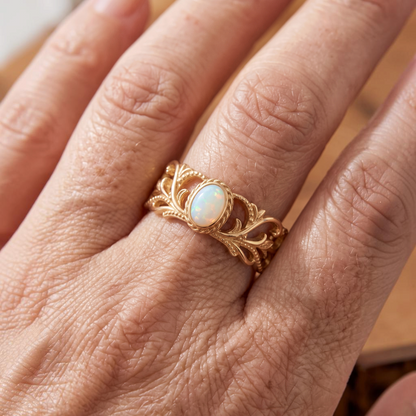 Verstelbare ring met wit opaal en bladranken | Goud